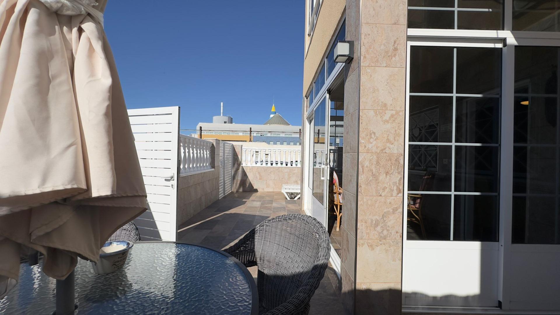 Pool area in bungalow for sale in Torrevieja