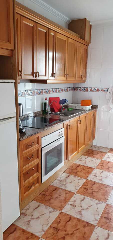 Living room in apartment for sale in Cabo Roig
