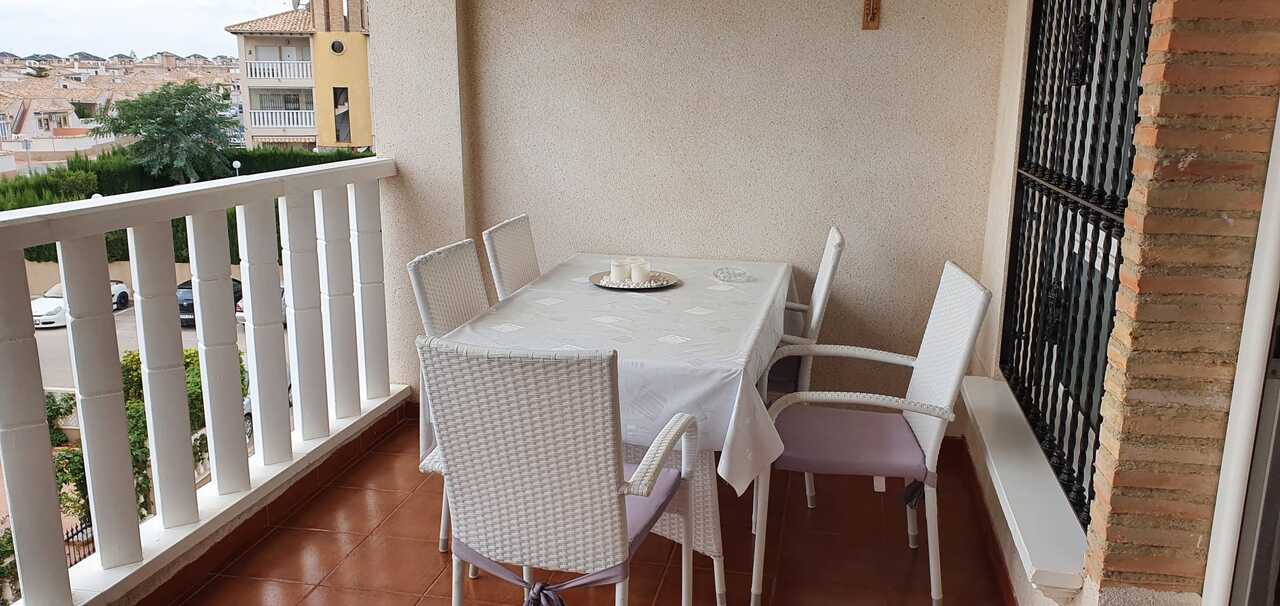 Pool area in apartment for sale in Cabo Roig