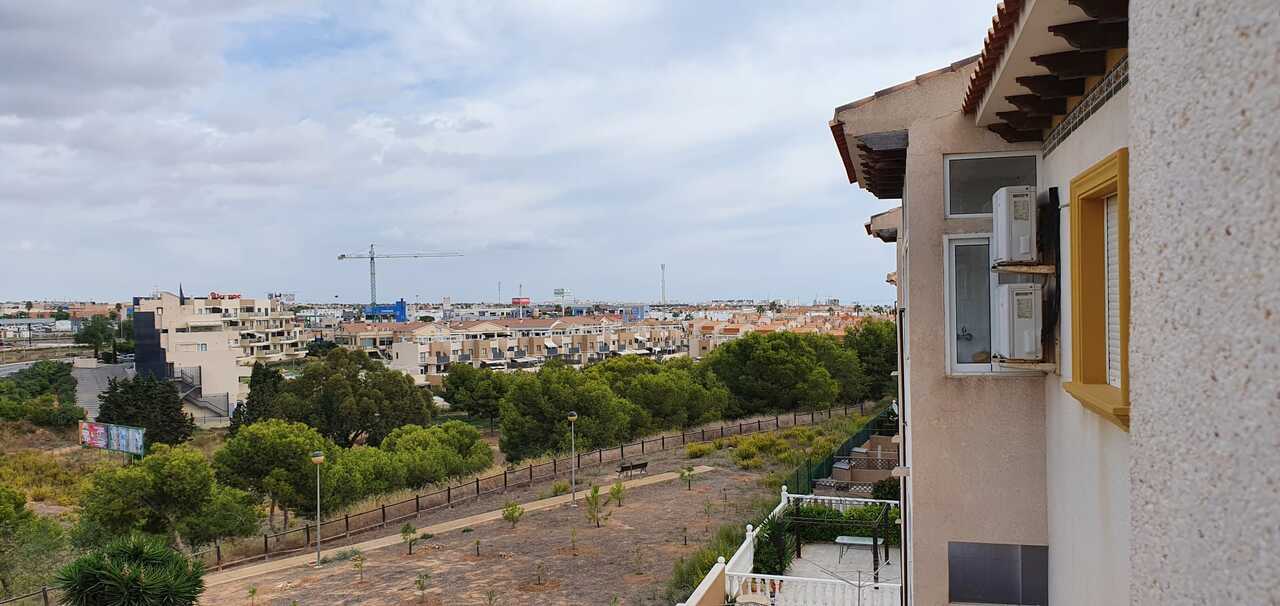Pool area in apartment for sale in Cabo Roig