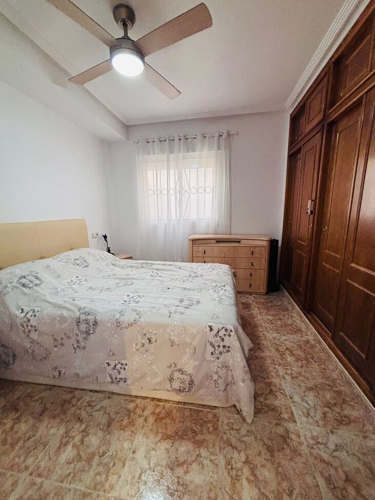 Living room in apartment for sale in Punta Prima