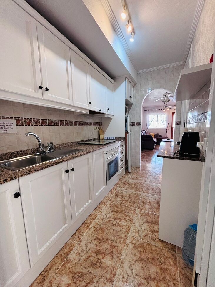 Pool area in apartment for sale in Punta Prima