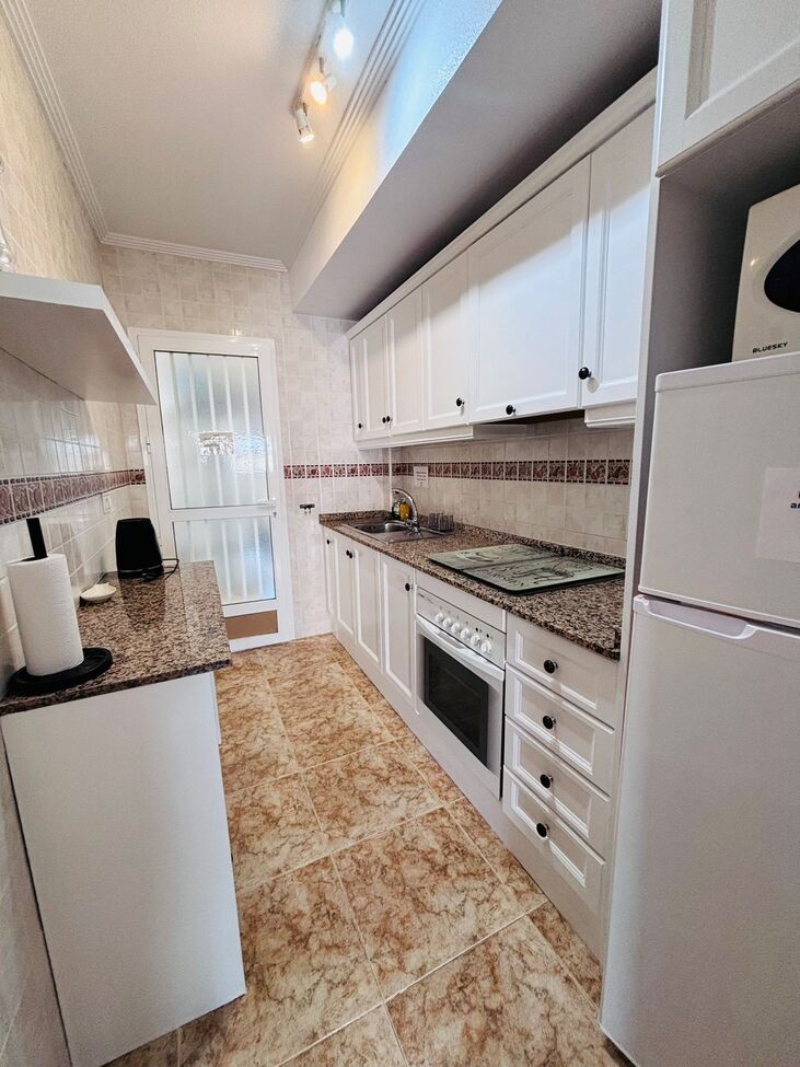 Garden in apartment for sale in Punta Prima
