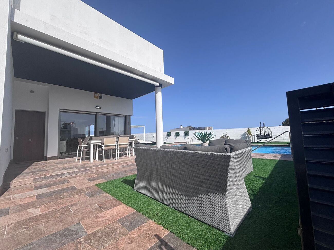 Pool area in villa for sale in Villamartin