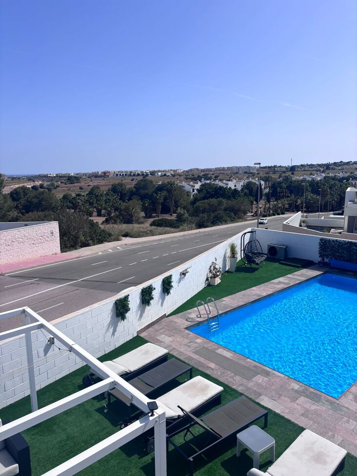 Pool area in villa for sale in Villamartin