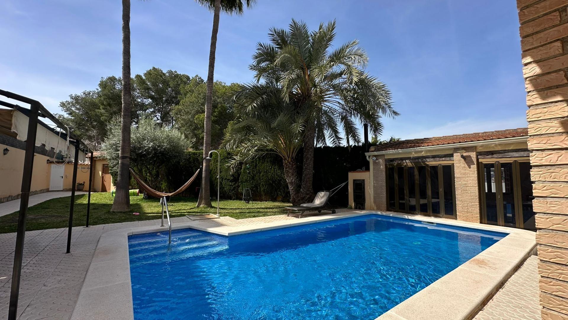 Pool area in villa for sale in Torrevieja