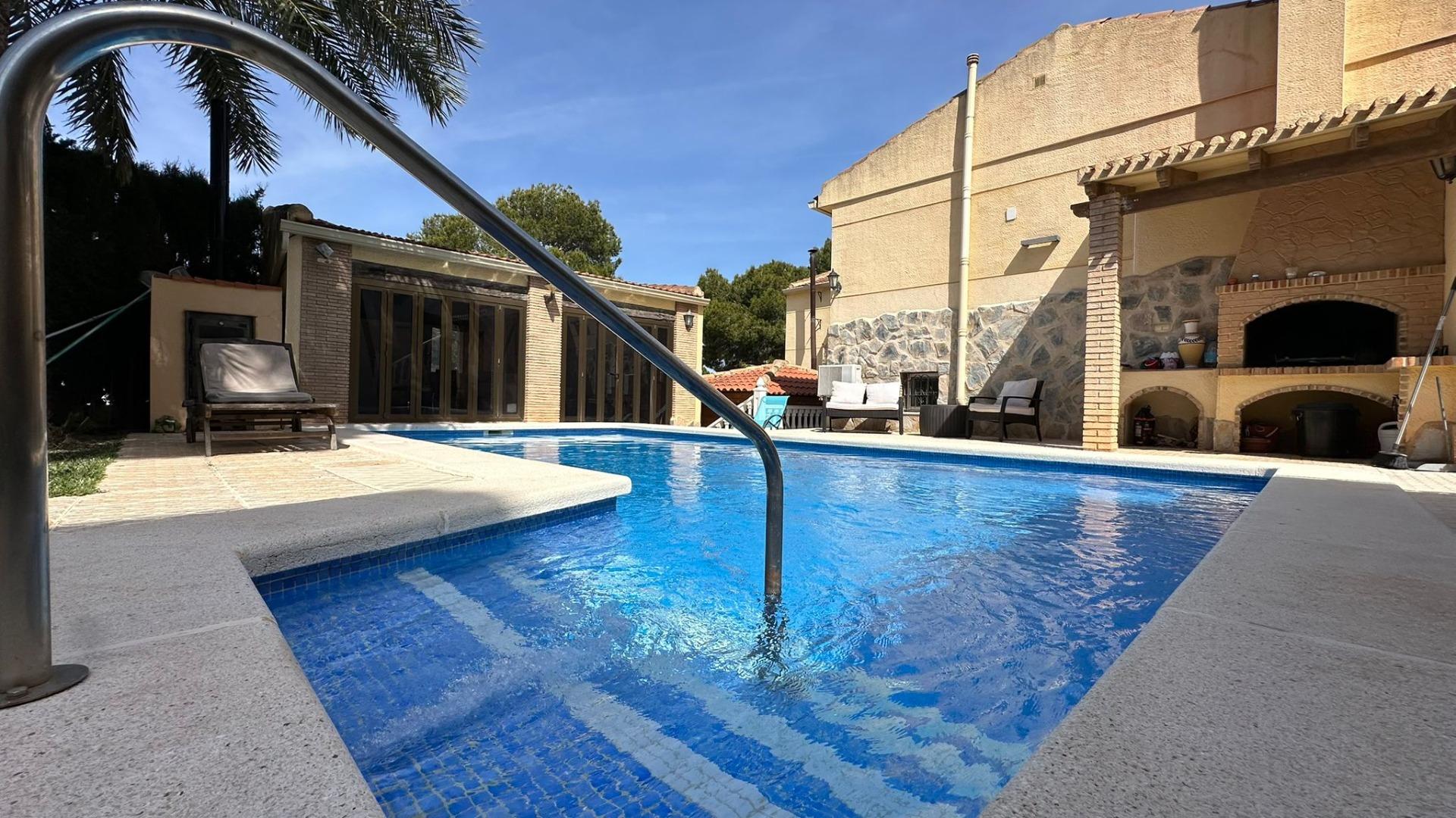 Pool area in villa for sale in Torrevieja
