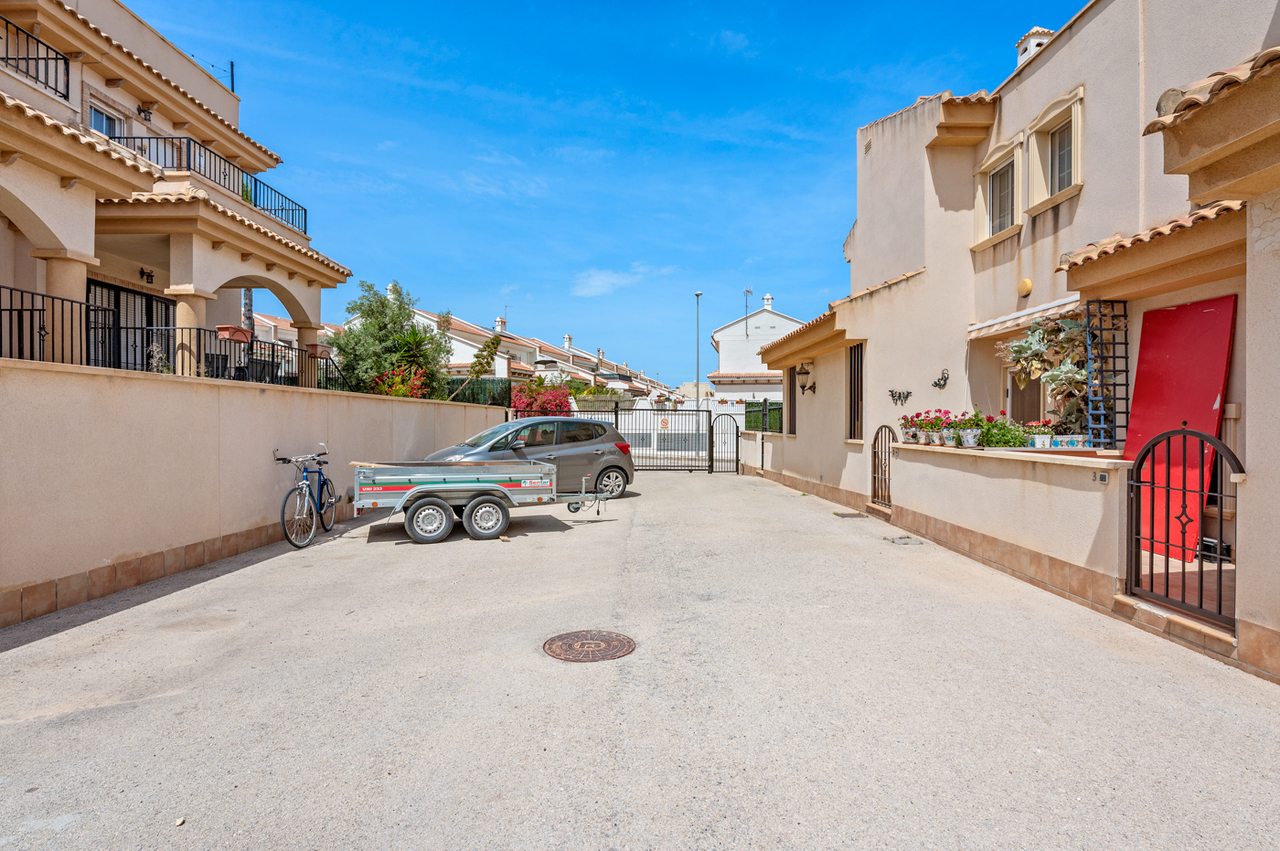 Pool area in terraced for sale in San Miguel de Salinas