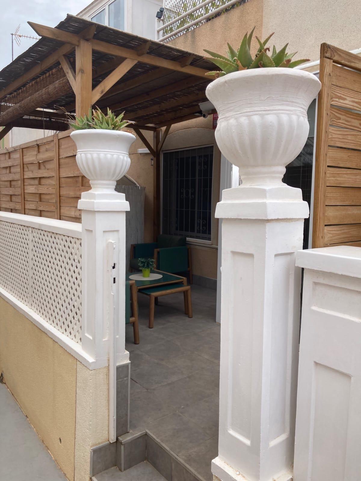 Pool area in bungalow for sale in Torrevieja