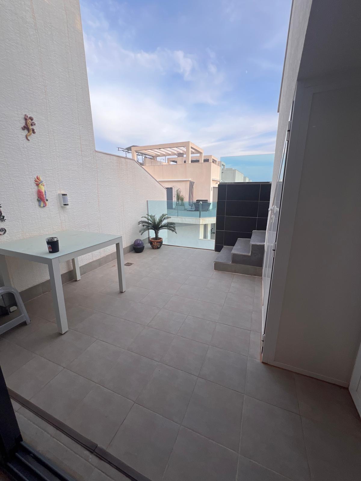 Pool area in penthouse for sale in Guardamar del Segura