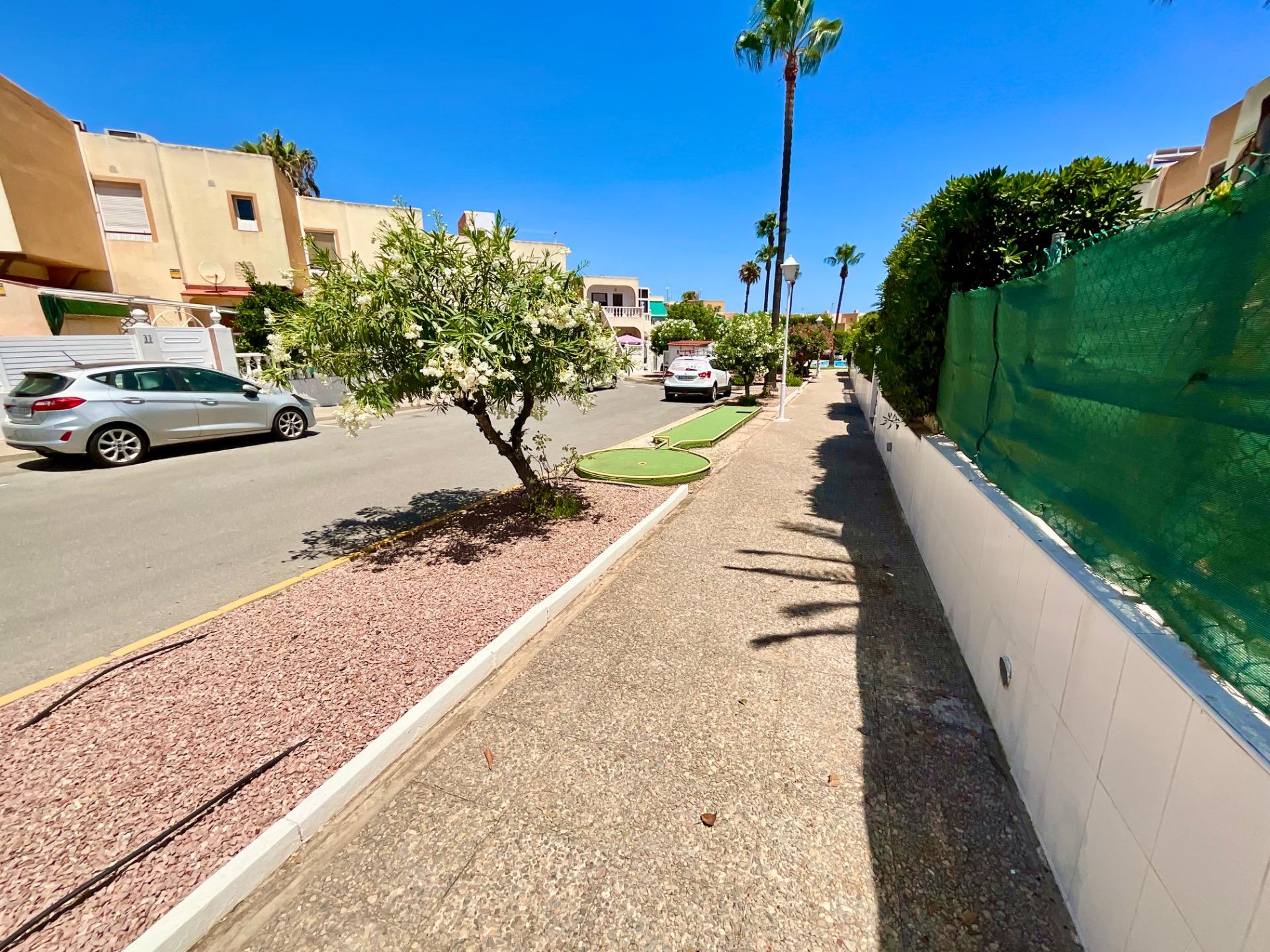 Pool area in bungalow for sale in Torrevieja