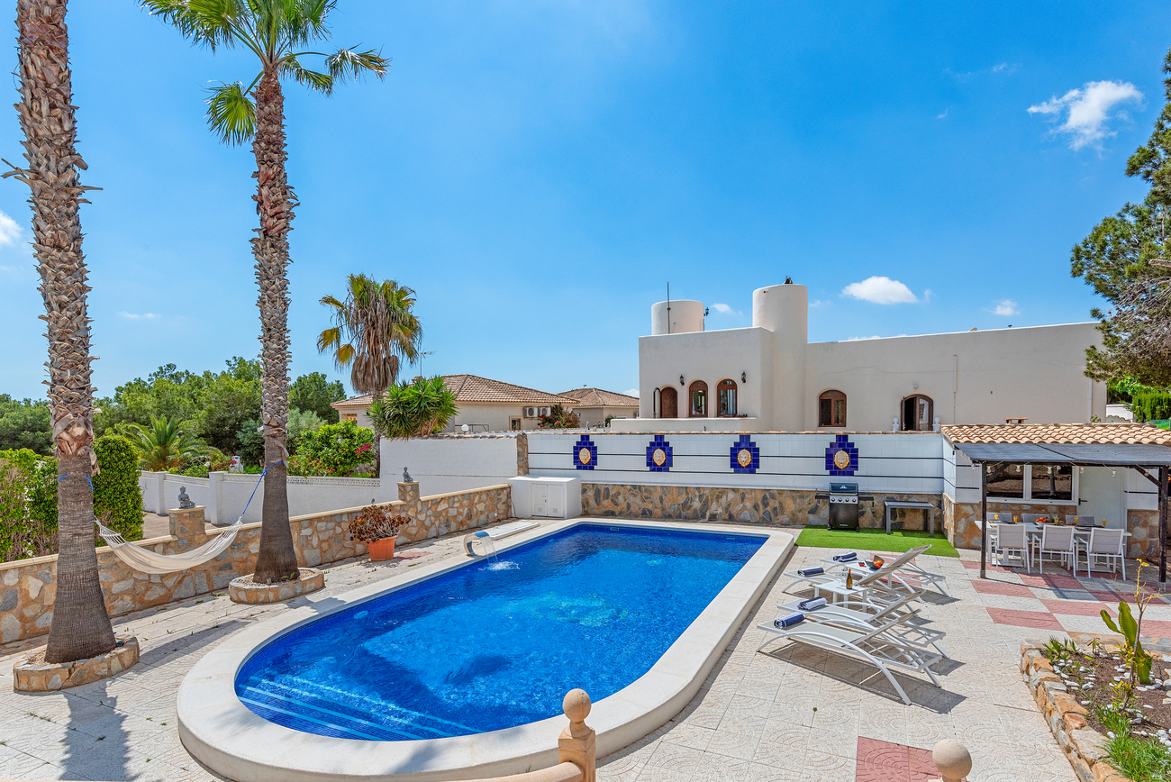 Pool area in villa for sale in Pinar de Campoverde