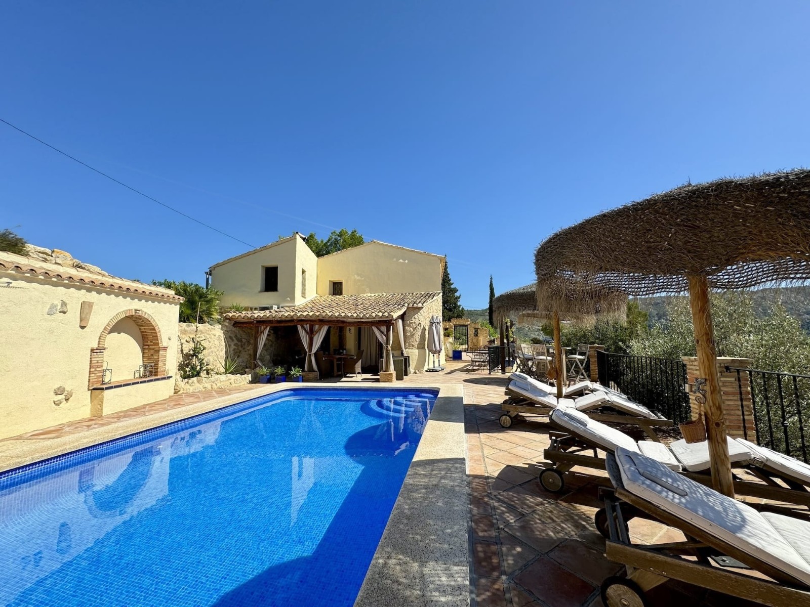 Pool area in villa for sale in Relleu