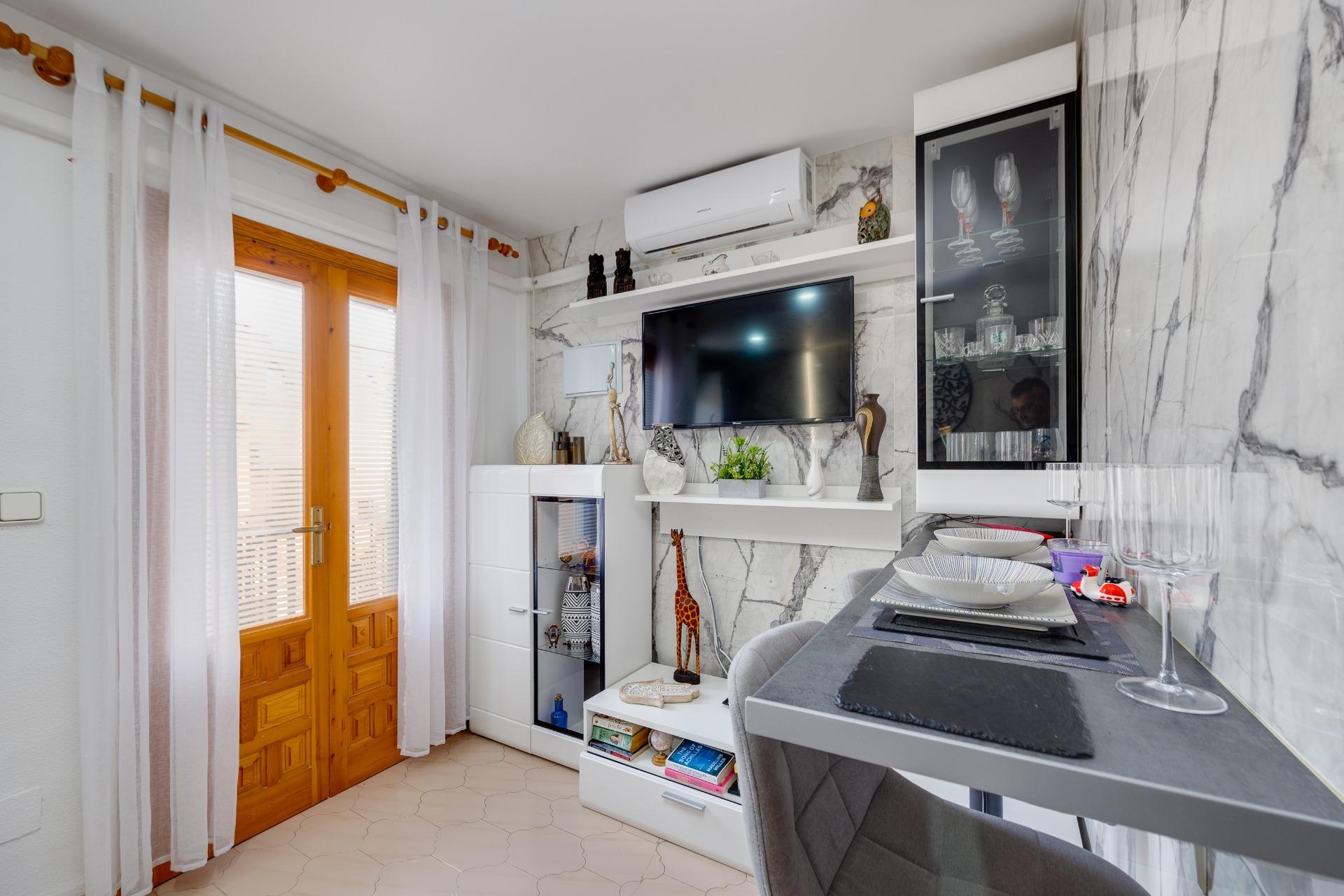 Pool area in bungalow for sale in Torrevieja