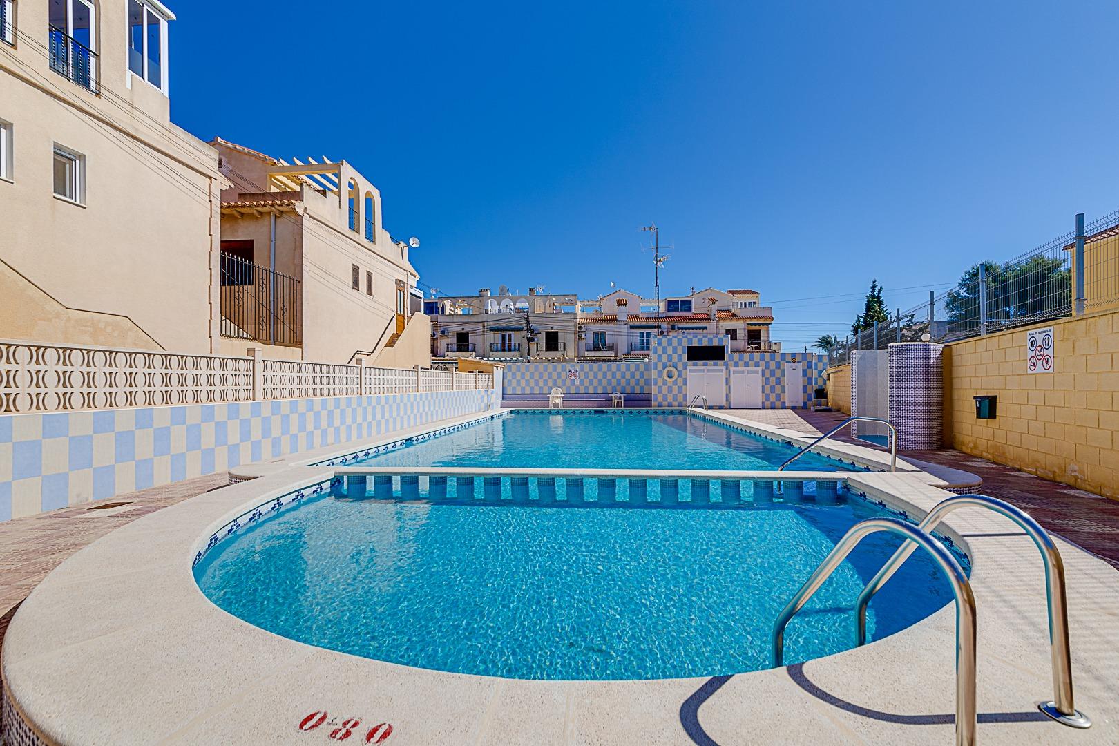 Pool area in bungalow for sale in Torrevieja