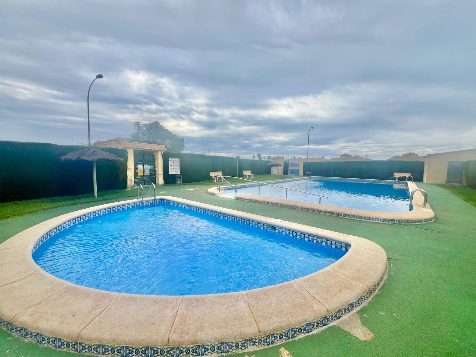 Pool area in bungalow for sale in Torrevieja