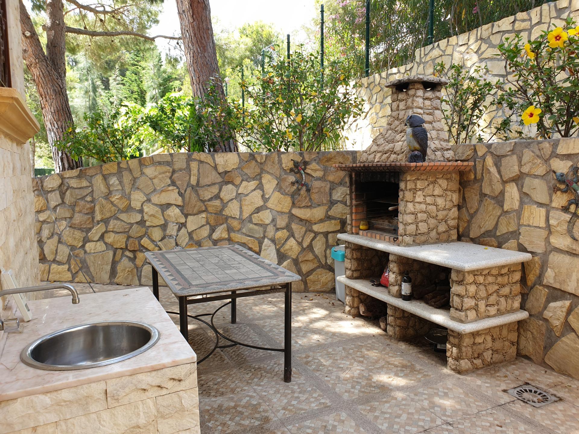 Pool area in villa for sale in Orihuela Costa