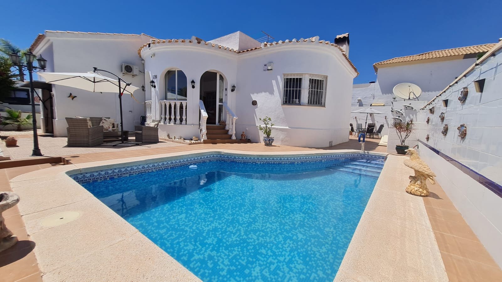 Pool area in villa for sale in Orihuela Costa