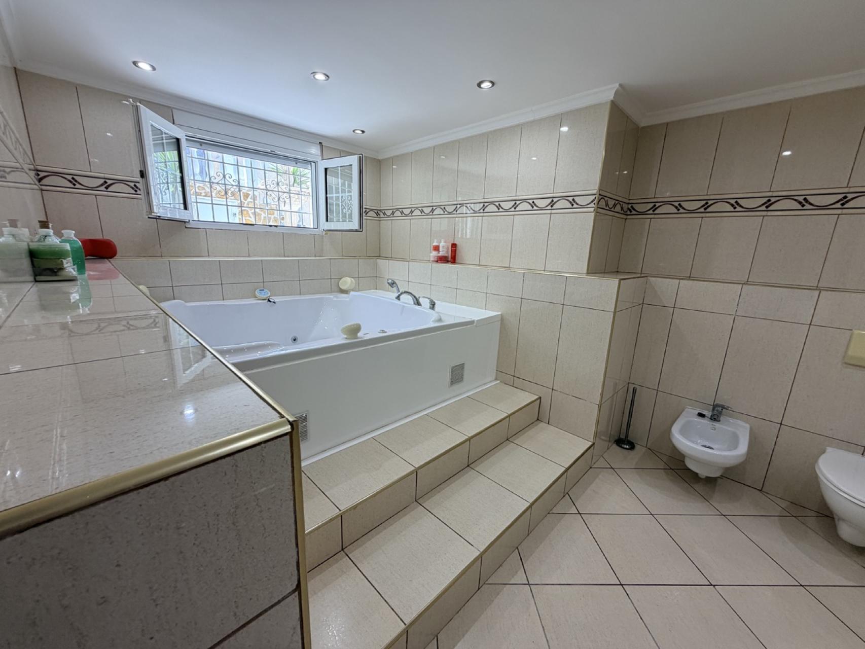Pool area in villa for sale in Torrevieja