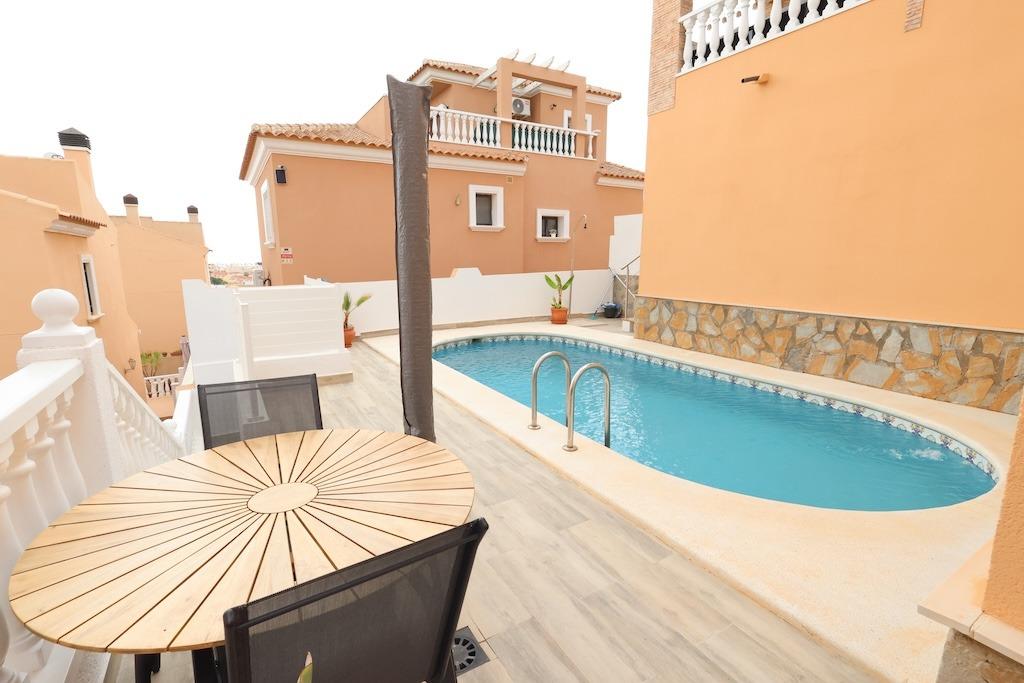 Pool area in villa for sale in San Miguel de Salinas