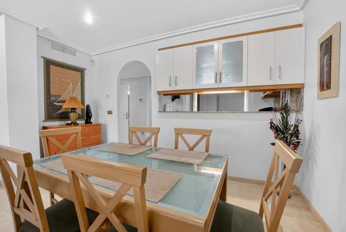 Pool area in apartment for sale in Cabo Roig