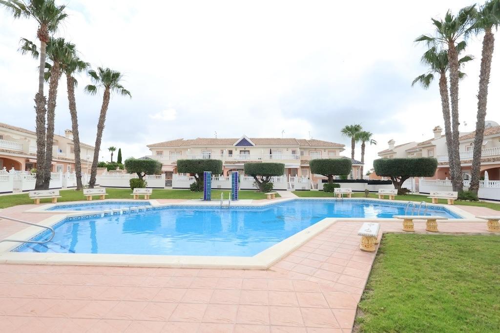 Pool area in terraced for sale in Rojales