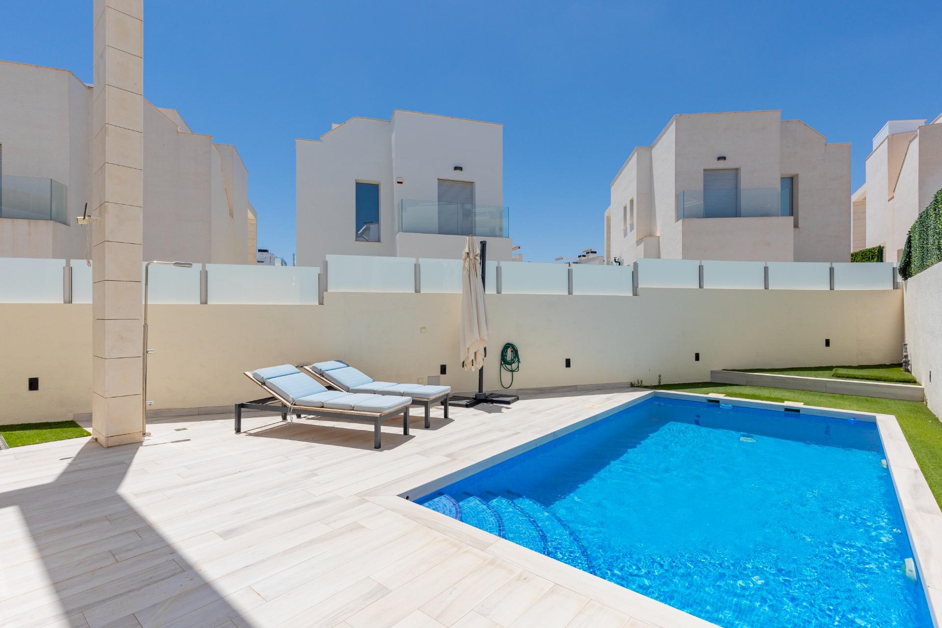 Pool area in villa for sale in Orihuela Costa