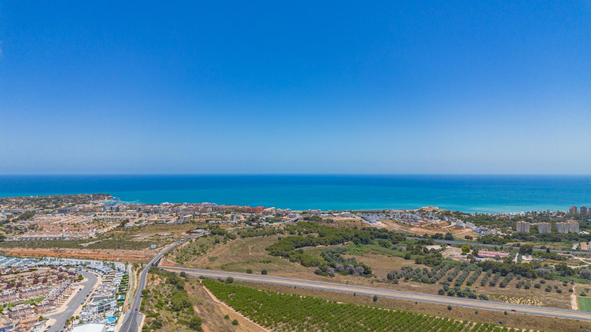 Pool area in villa for sale in Orihuela Costa