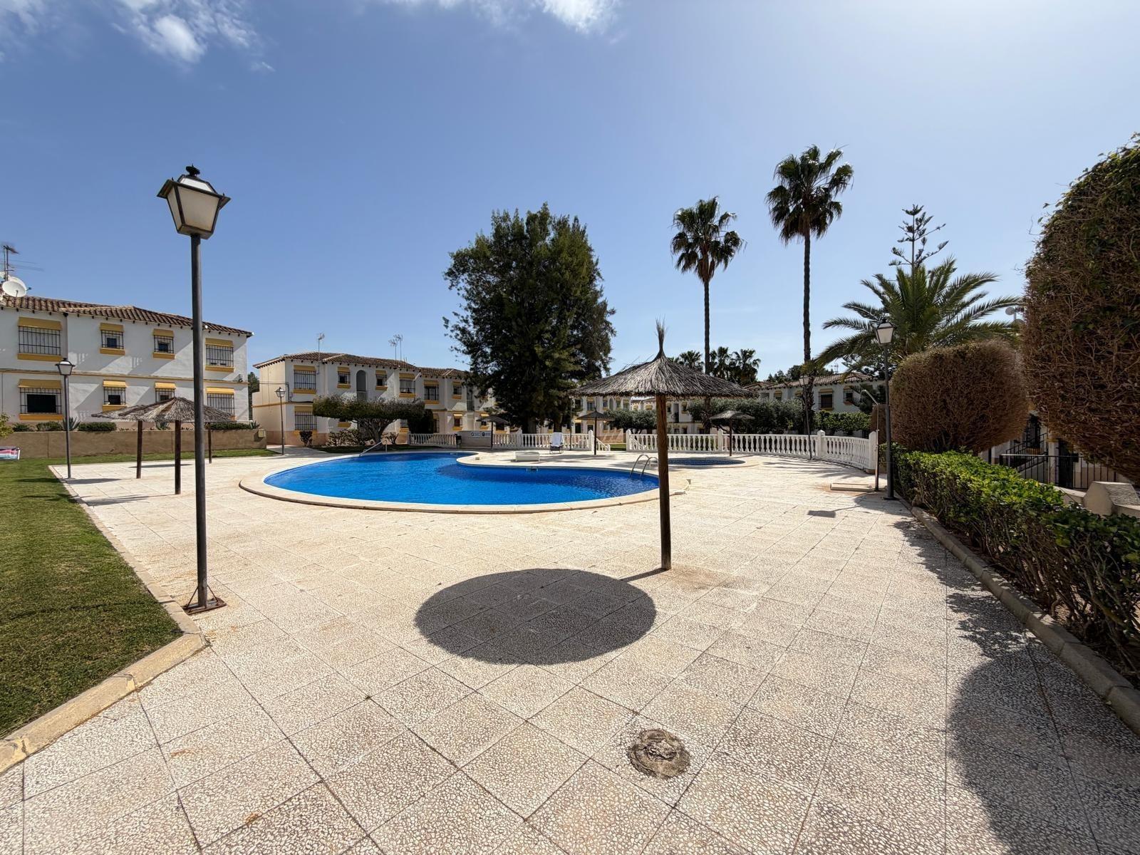 Pool area in apartment for sale in San Miguel de Salinas
