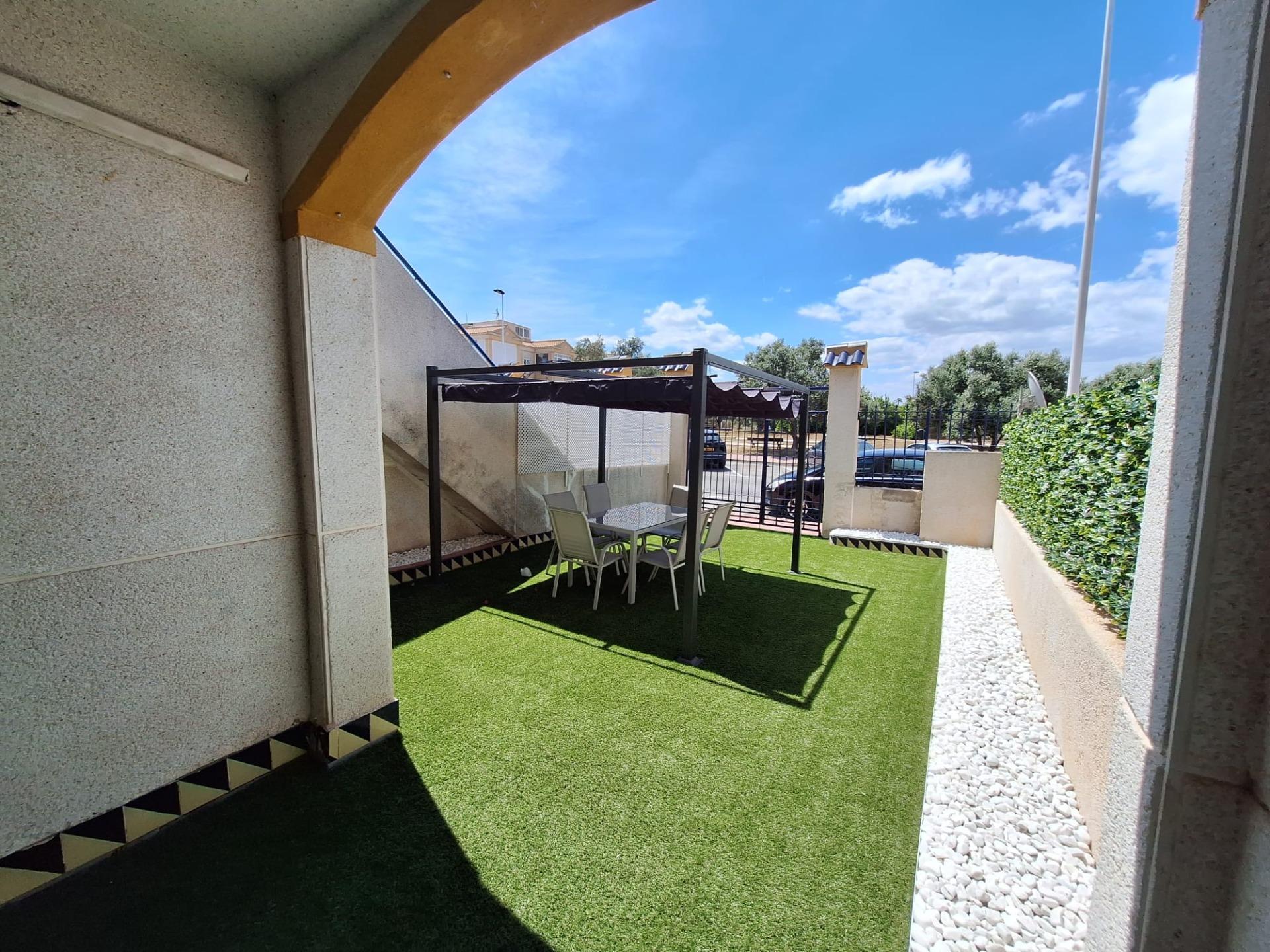 Pool area in bungalow for sale in Torrevieja