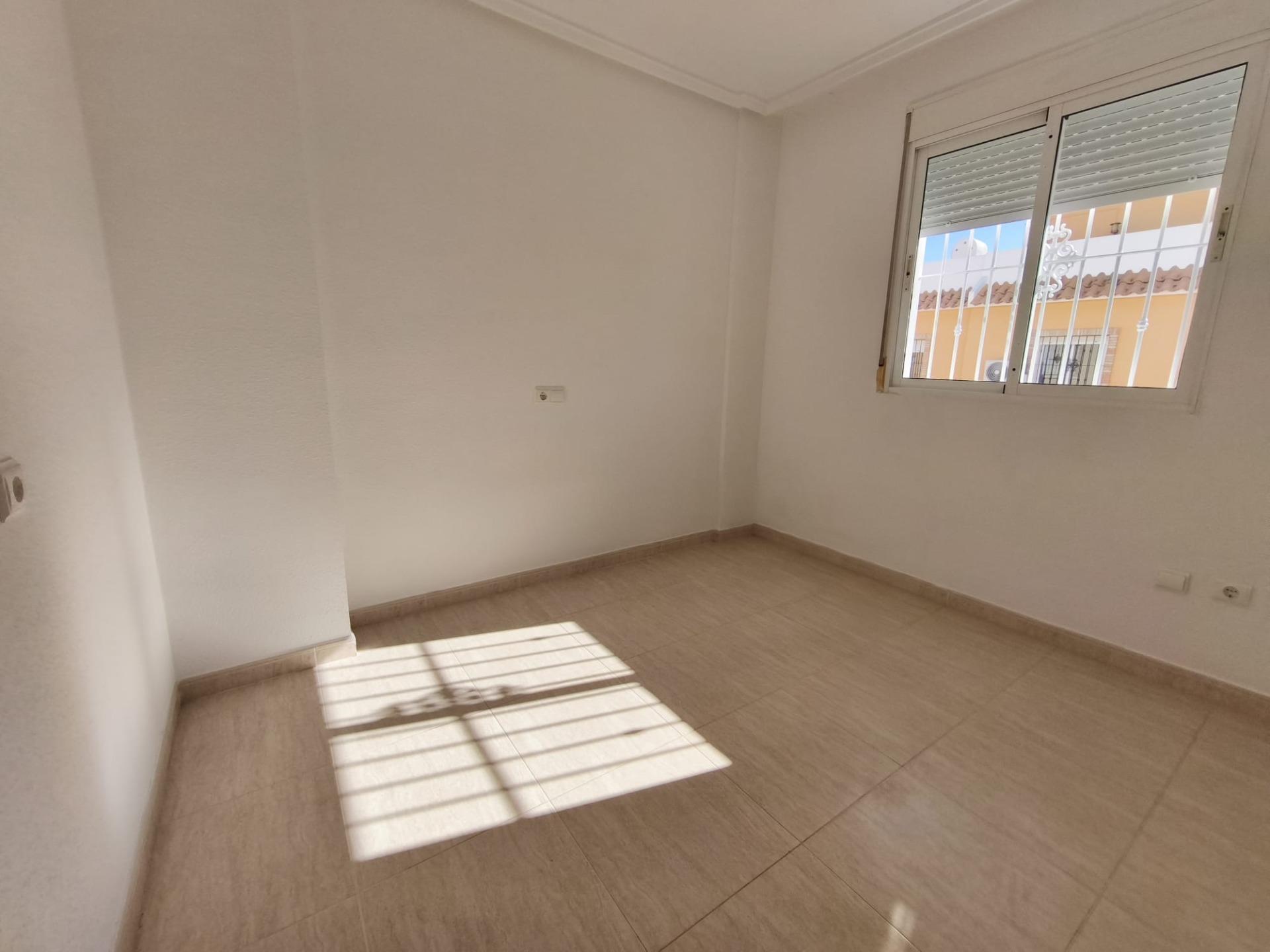 Master bedroom in villa for sale in Rojales