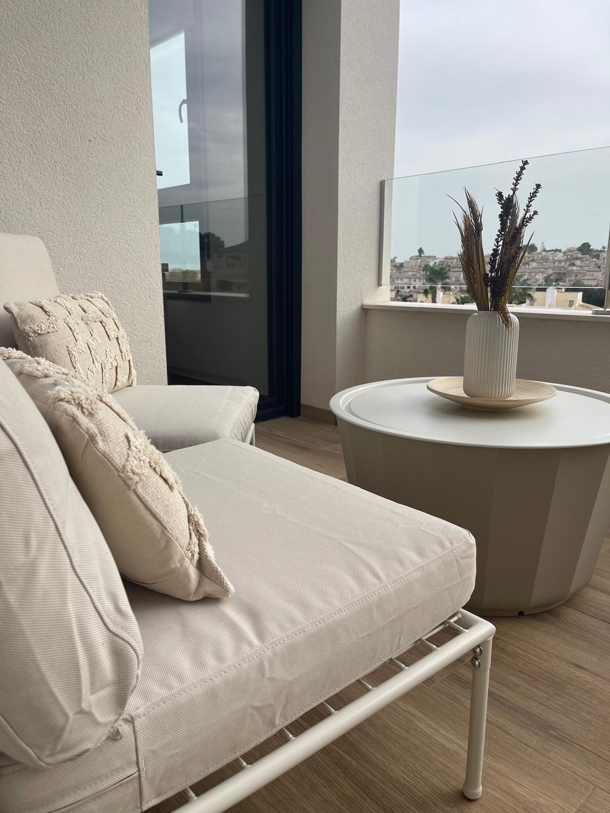 Living room in penthouse for sale in Orihuela Costa