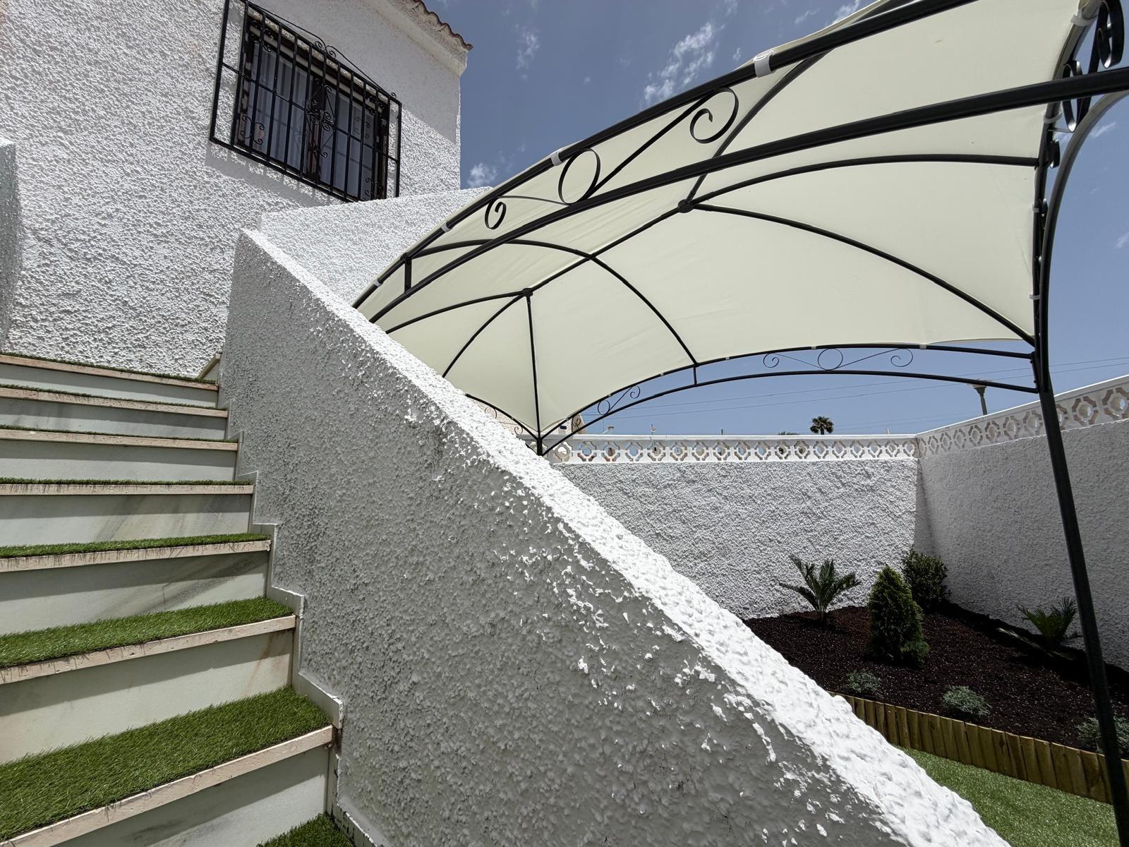 Pool area in bungalow for sale in Torrevieja