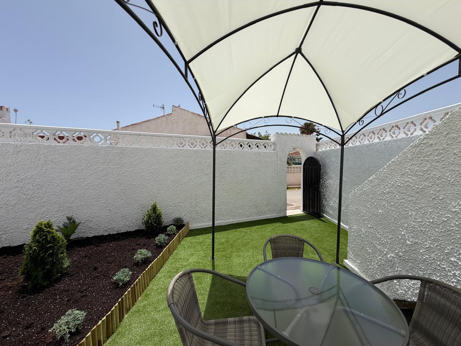 Pool area in bungalow for sale in Torrevieja