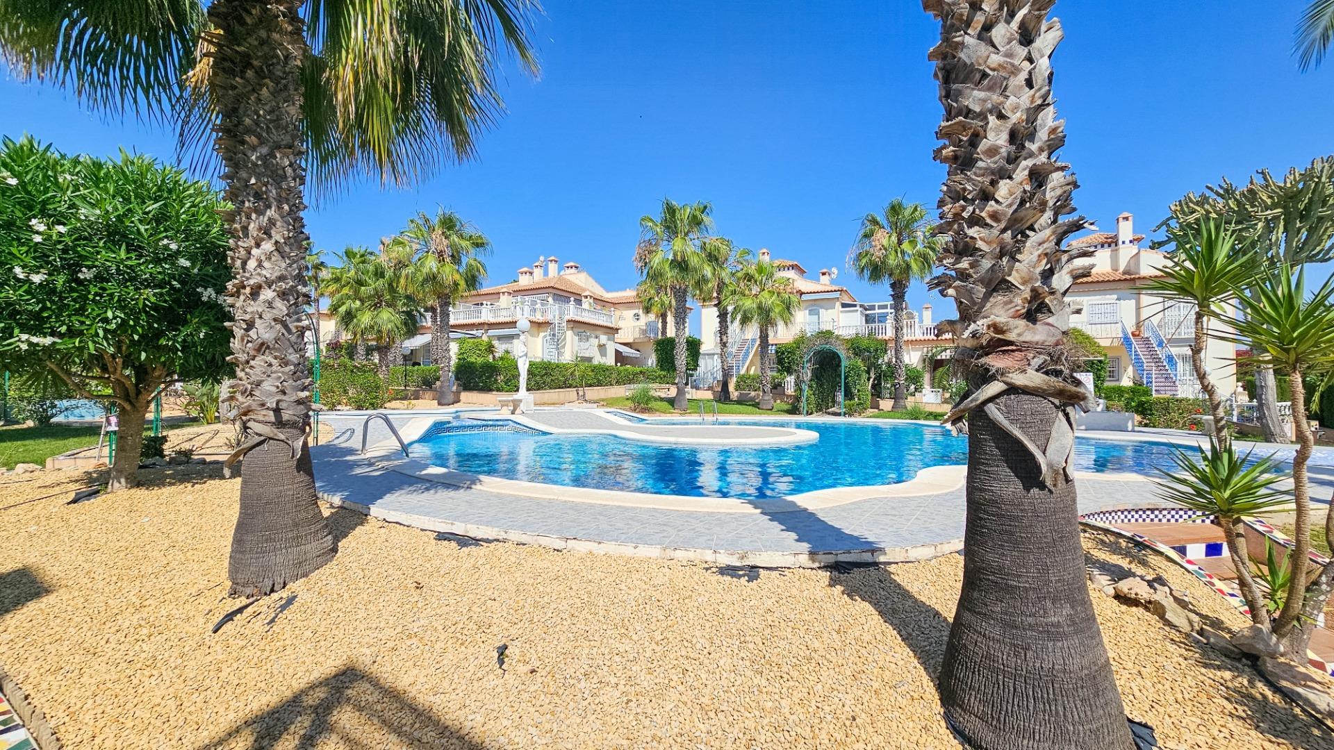 Pool area in bungalow for sale in Orihuela Costa