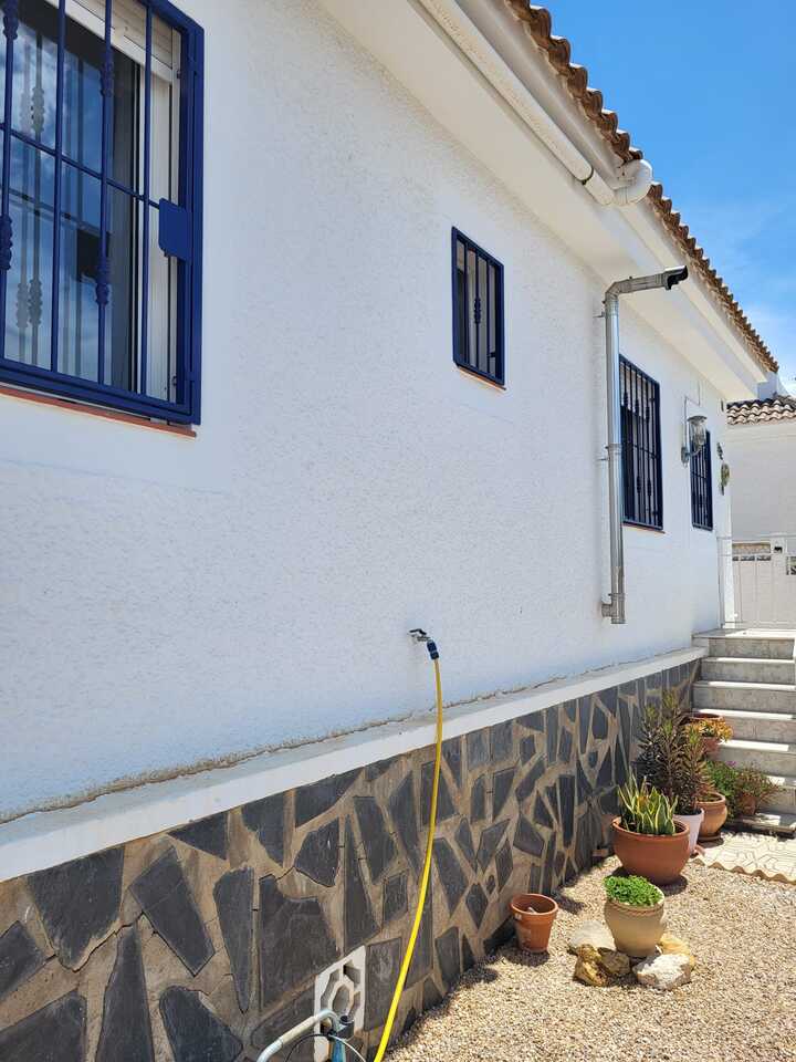 Pool area in villa for sale in Mazarron