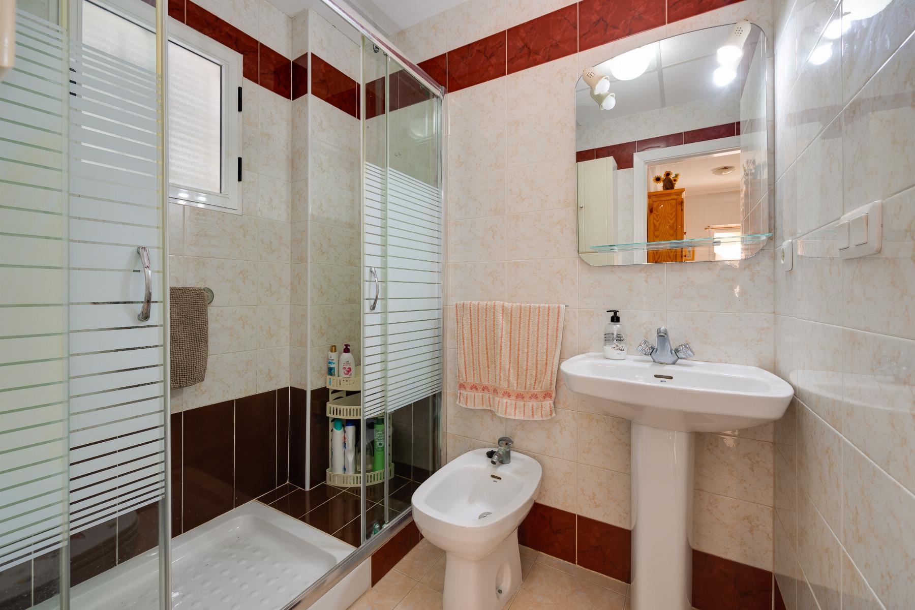 Pool area in bungalow for sale in Torrevieja