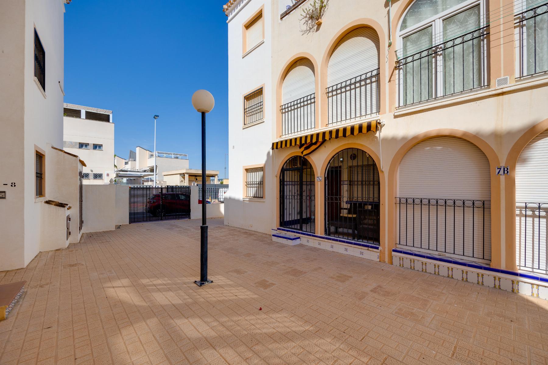 Pool area in bungalow for sale in Torrevieja