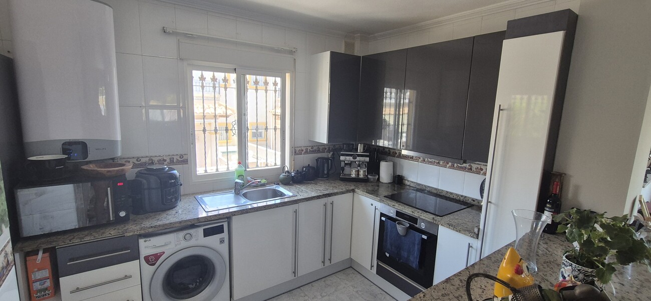 Pool area in villa for sale in Villamartin