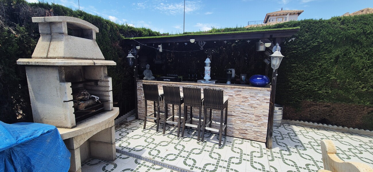 Pool area in villa for sale in Villamartin