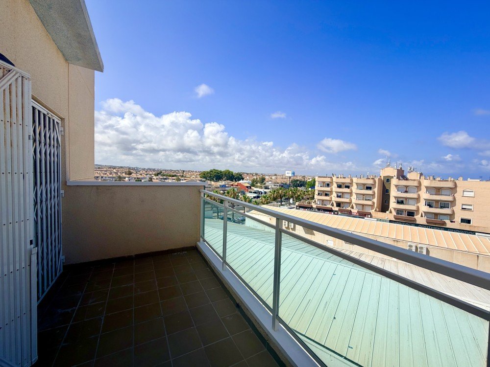 Living room in penthouse for sale in Orihuela Costa