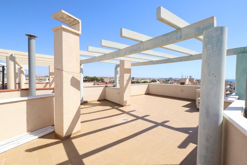 Living room in penthouse for sale in Orihuela Costa