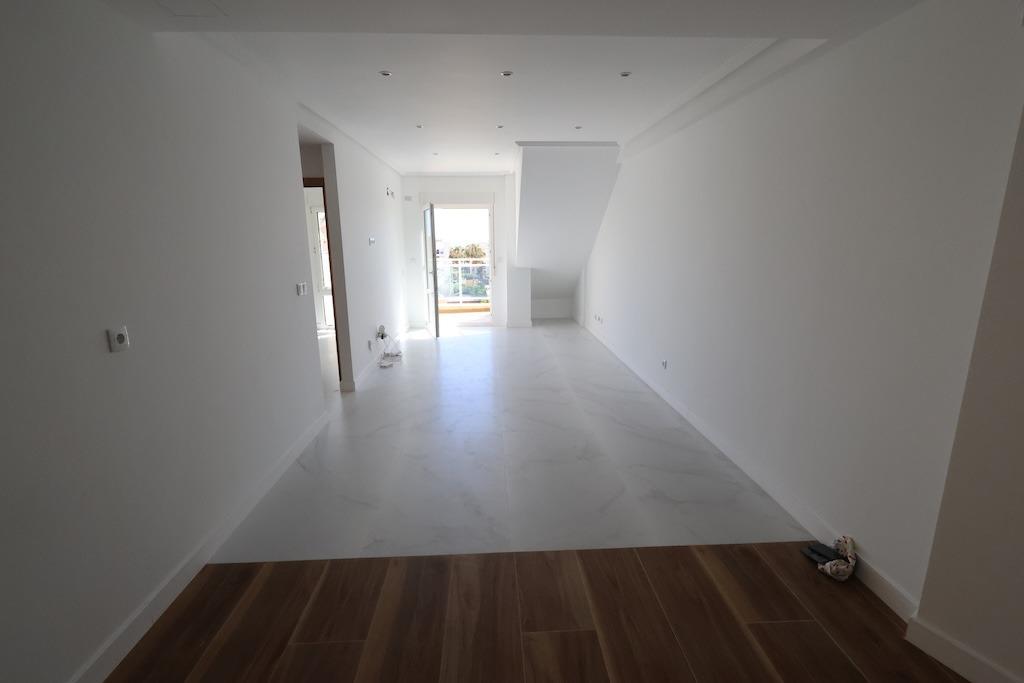 Orihuela Costa 两卧顶层公寓——海景生活的完美典范