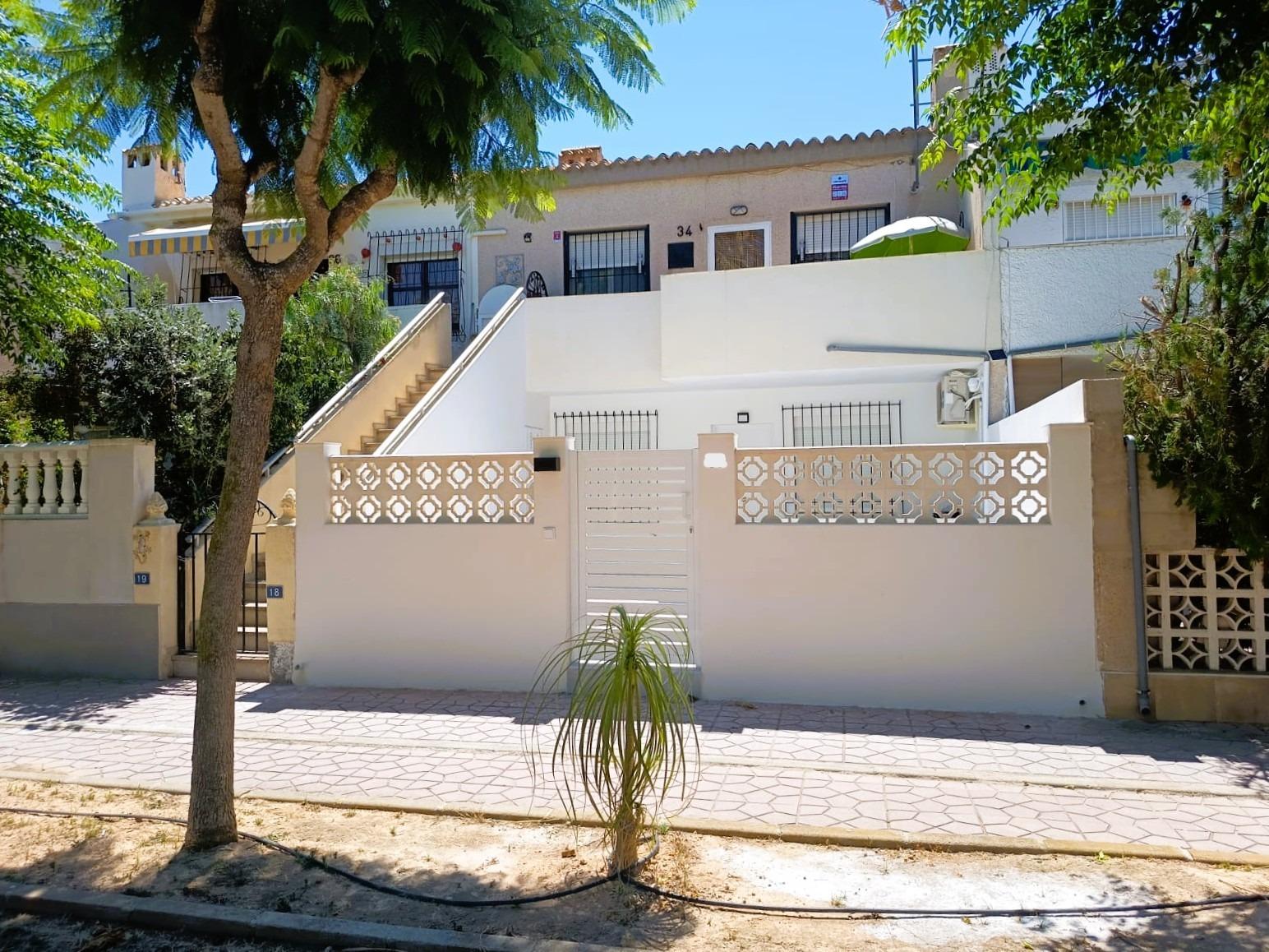 Pool area in bungalow for sale in Orihuela Costa