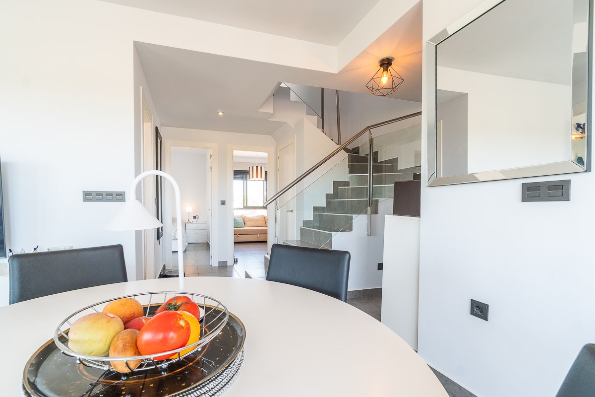 Living room in penthouse for sale in Villamartin