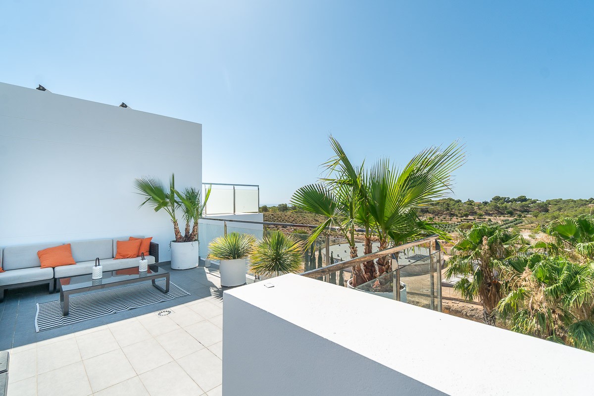 Living room in penthouse for sale in Villamartin