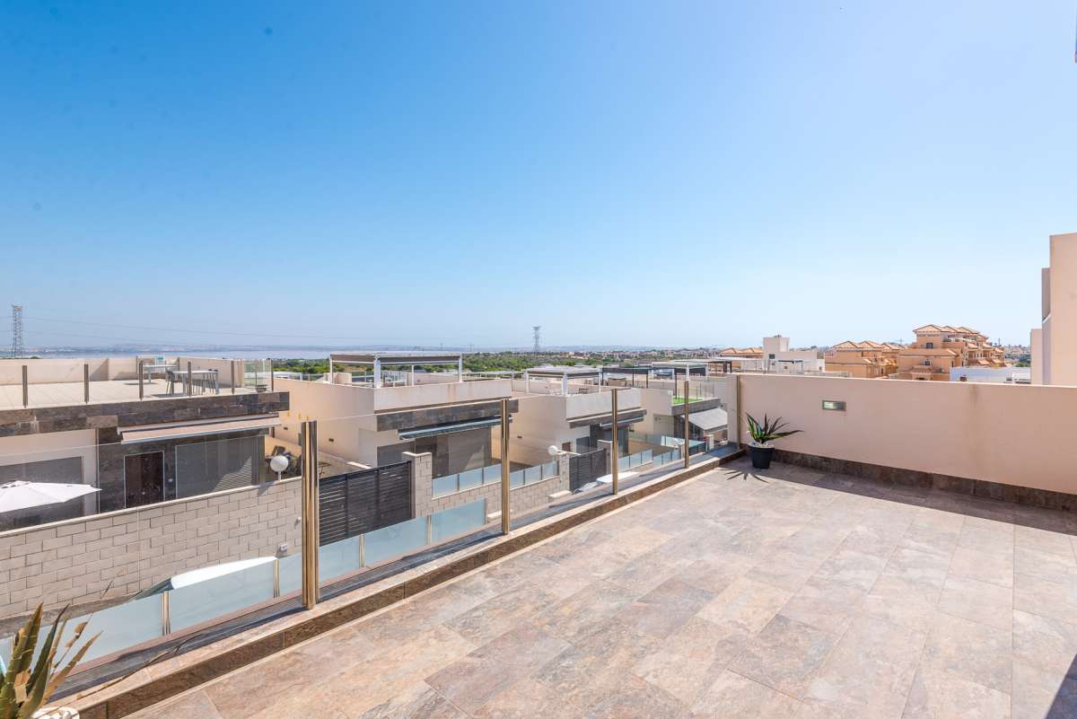 Pool area in villa for sale in Orihuela Costa