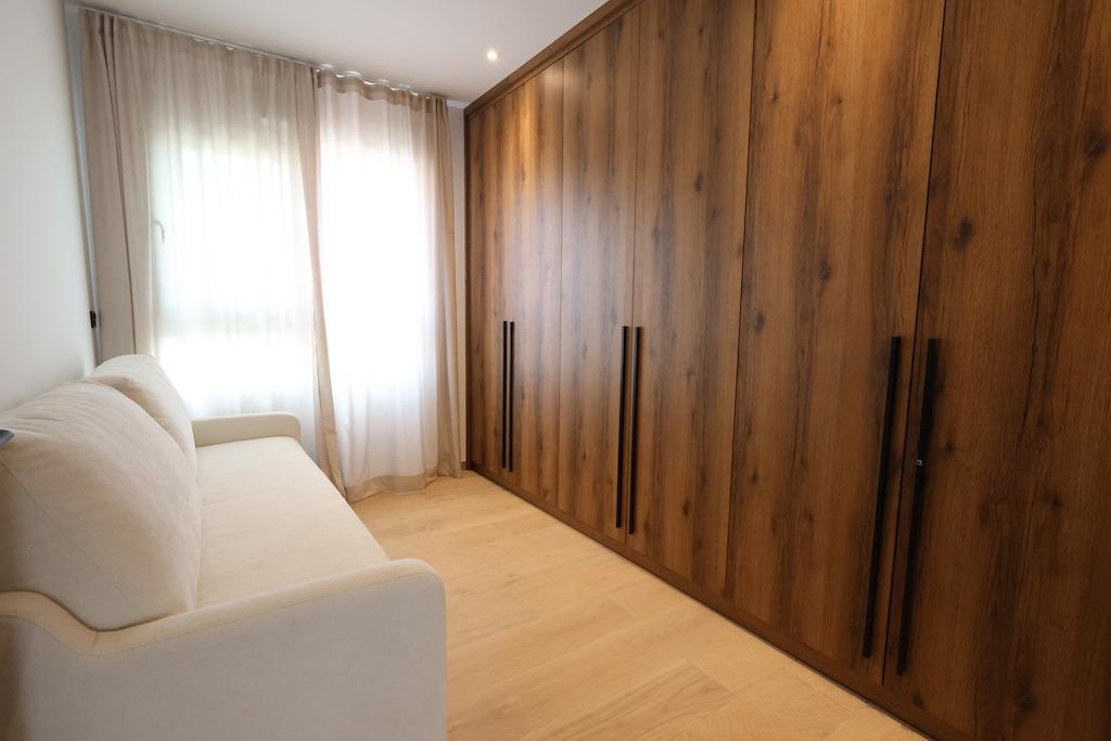 Master bedroom in penthouse for sale in Algorfa