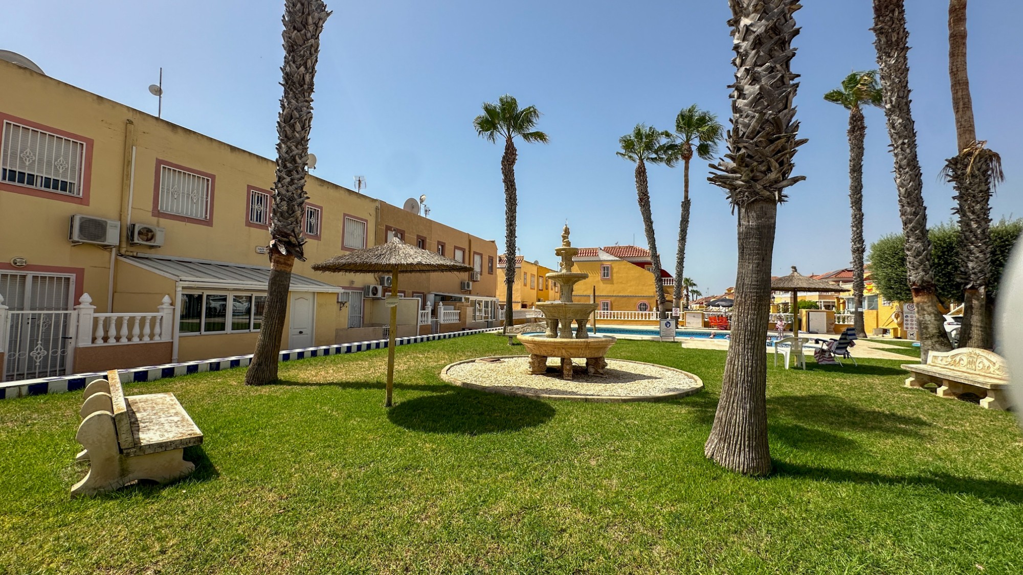 Pool area in terraced for sale in Orihuela Costa