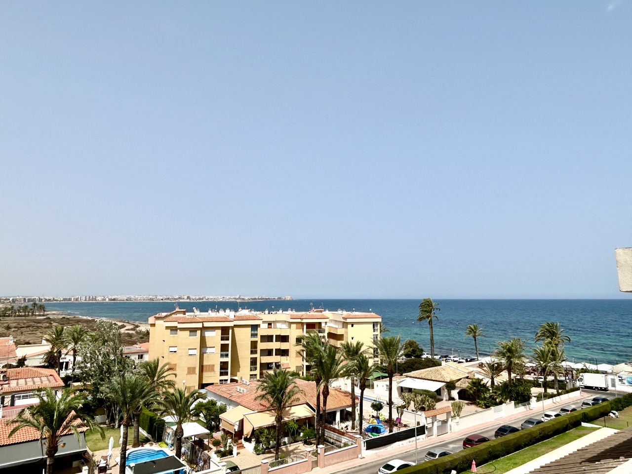 Pool area in apartment for sale in Punta Prima